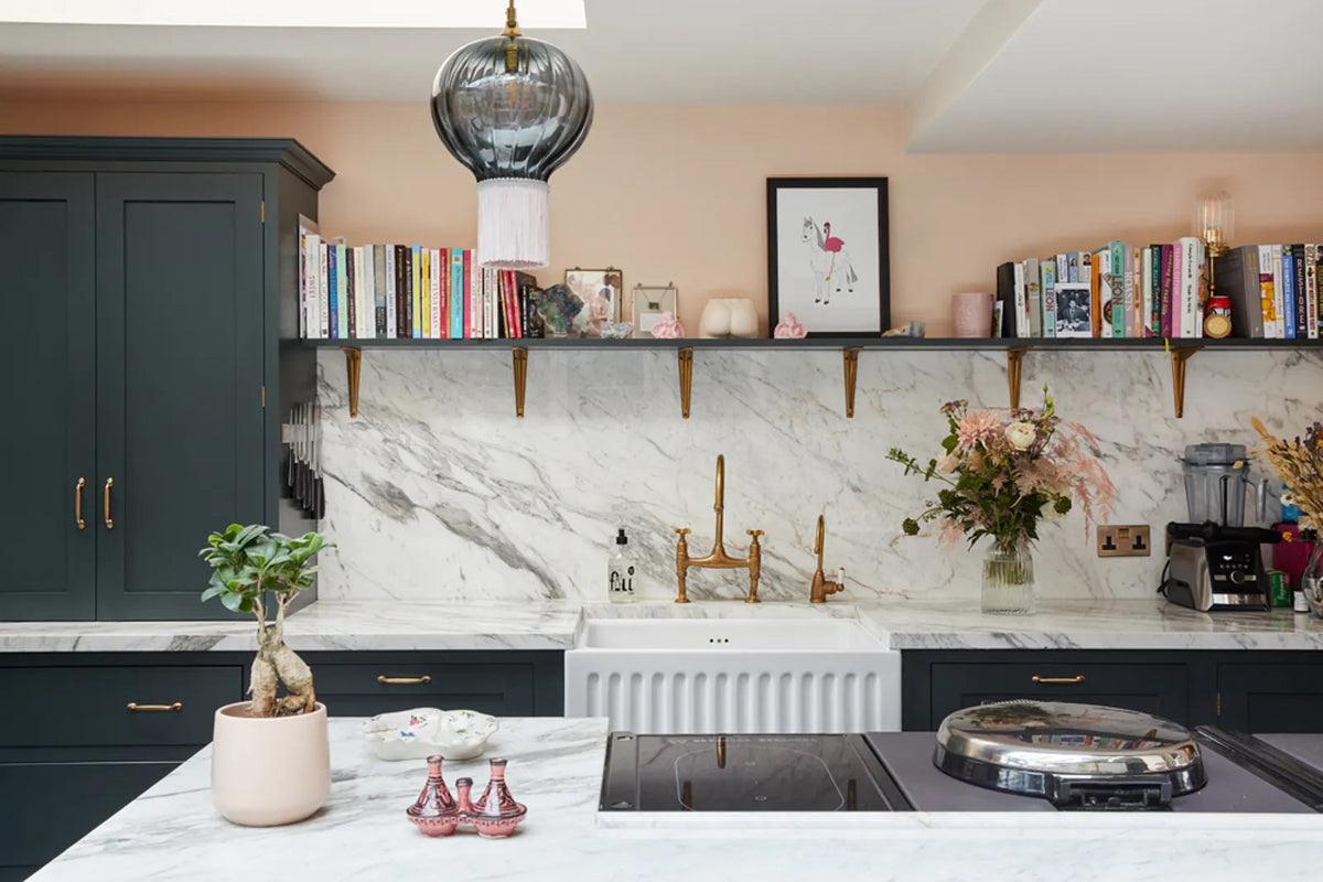 Daisy Lowe's kitchen with open shelving and walls painted in Lick Pink 02 