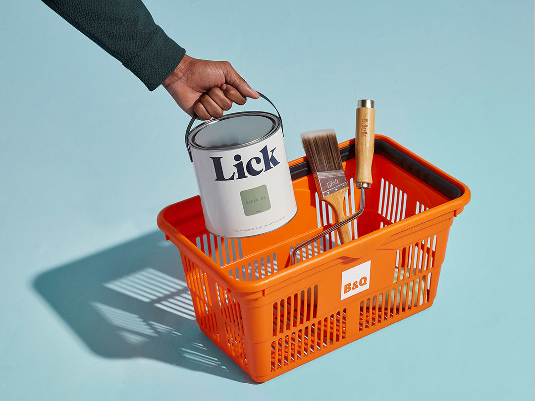 B&Q shopping basket containing Lick paint and Lick tools